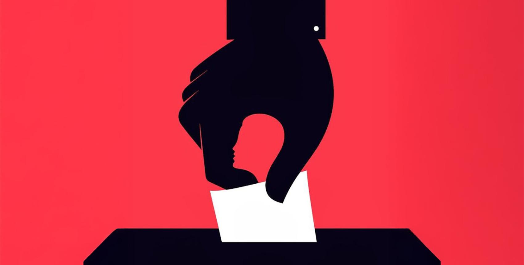 Mano en urna electoral 